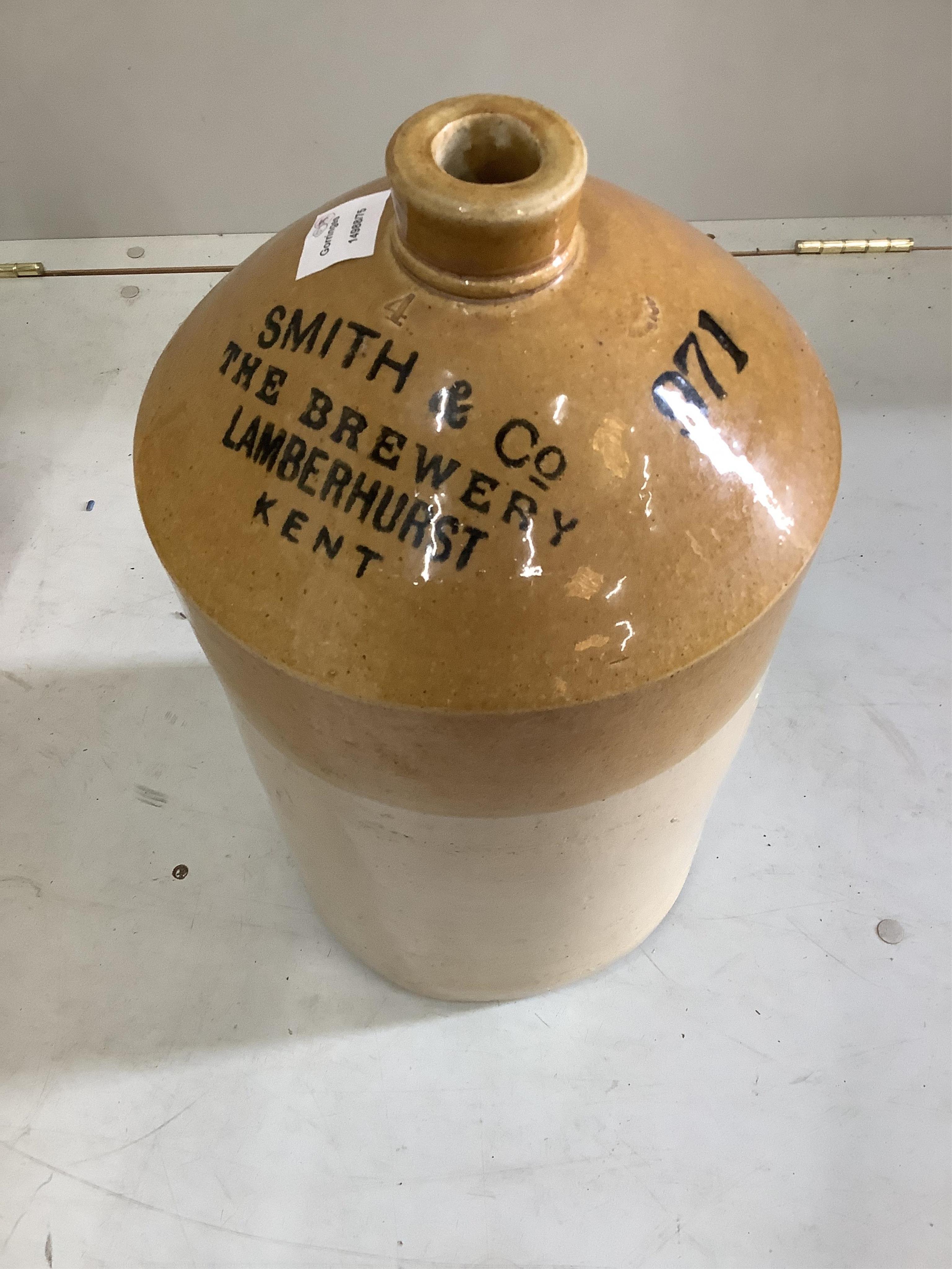 Nine earthenware flagons, largest height 48cm. Condition - fair